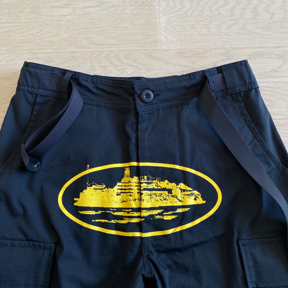 Corteiz Cargo Pants - Preto com Logótipo Amarelo